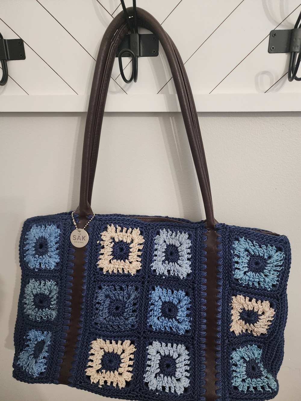 The Sak Navy Crochet Patchwork Tote with Blue and Cream Accents